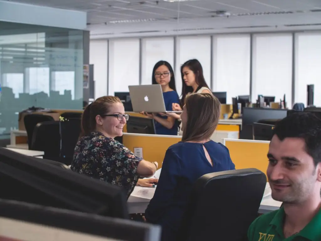 a office set up of professional with discussions and pair by pair discussion to each other