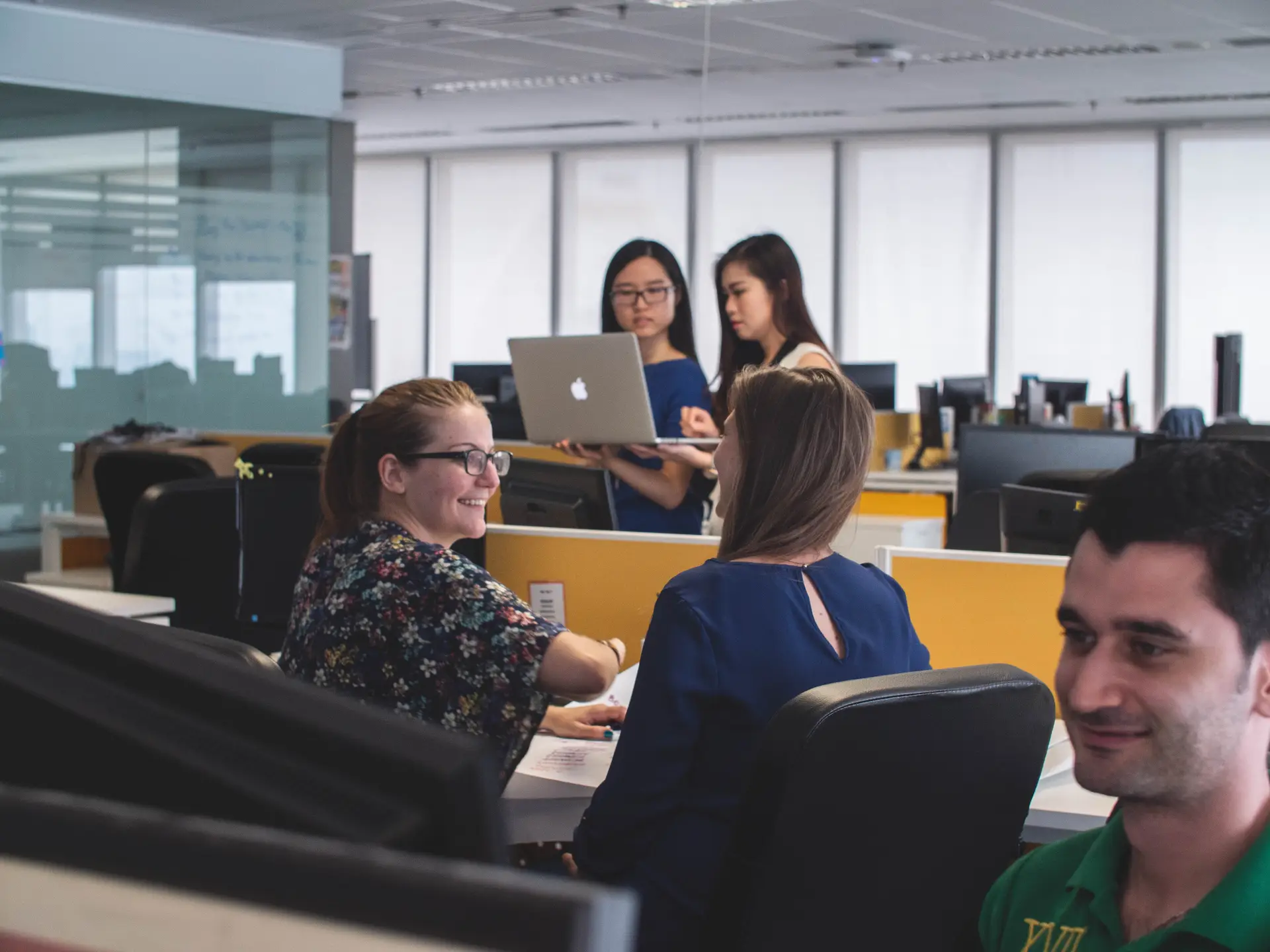 a office set up of professional with discussions and pair by pair discussion to each other